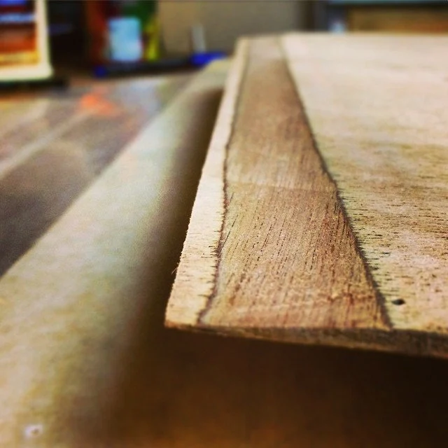 close up photo of pieces of wood for boat building