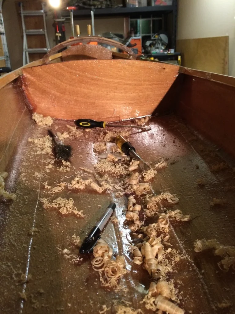 wood shavings inside of kayak