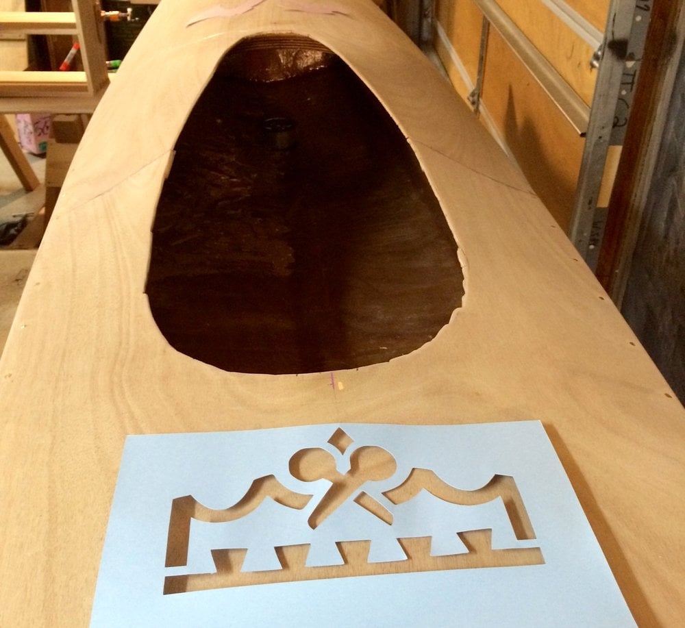 apply Kingston Crafts logo stencil to wood kayak