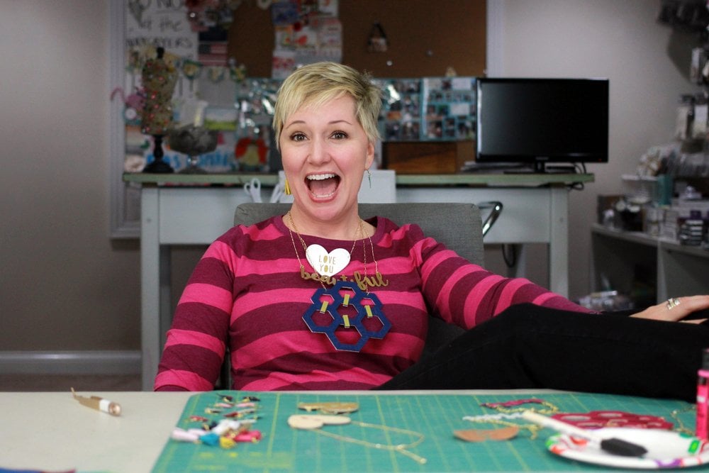 Beth Kingston wearing custom made necklaces with cricut 