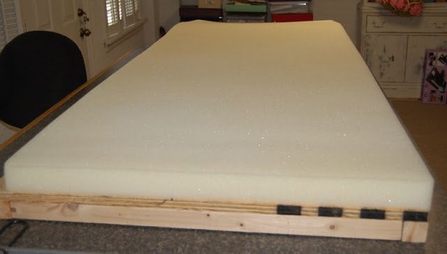 apply urethane foam sheet on top of wood panel bench top