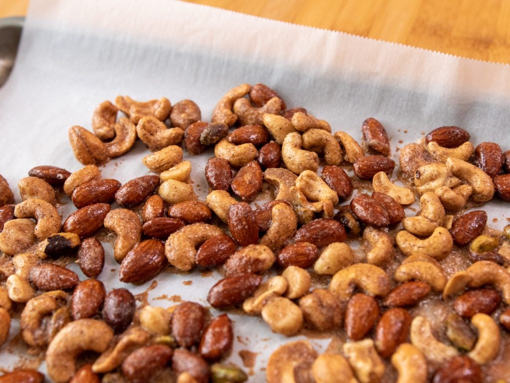 mixed nuts on baking sheet