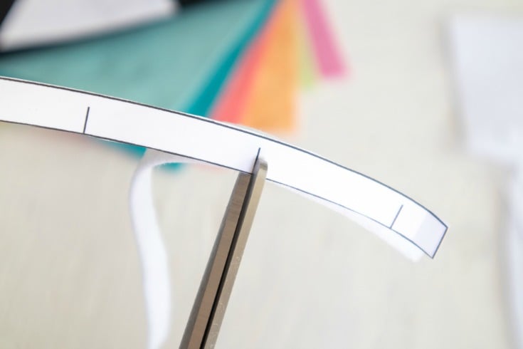 diy nursery wall art ideas cutting notch into felt strip