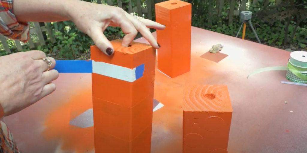 peeling painters tape off of wood block