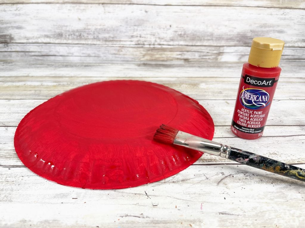 painting paper plate red