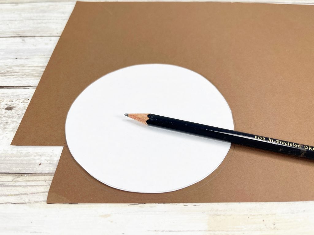 trace center of sunflower onto brown paper